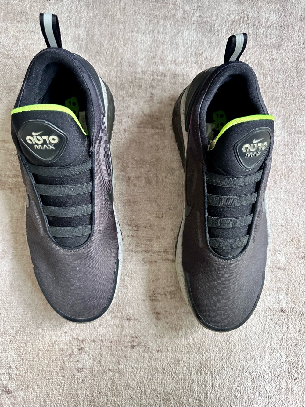 Nike Black Slip-On Sneakers with Neon Green Accent